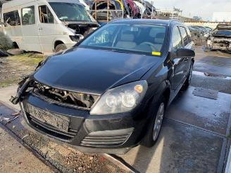 Damaged car Opel Astra Astra H SW (L35), Combi, 2004 / 2014 1.6 16V Twinport 2006/11