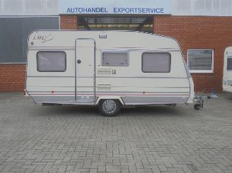 krockskadad bil caravan LMC  Europa 450, Voortent, cassette toilet 1994/6